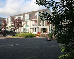 Hotelli Mukava huoneisto sijaitsee asuinpaikka suoraan lähellä puuta vain 750 metrin päässä merestä. (De Koog, Hollanti)