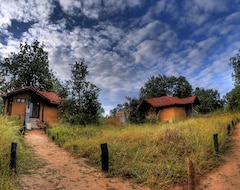 Khách sạn Pugdundee Safaris - Kanha Earth Lodge (Mandla, Ấn Độ)