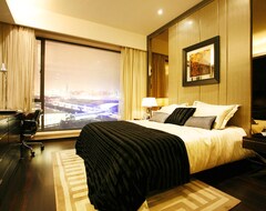 Hotel Poly World Trading Center Serviced Apartment (Guangzhou, Kina)