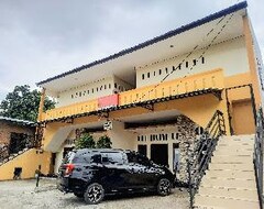 Otel Reddoorz Near Pantai Pasir Putih Parbaba (Simanindo, Endonezya)
