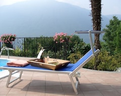 Toàn bộ căn nhà/căn hộ Park Residence With A Panoramic View Of Lake Lugano (Carlazzo, Ý)