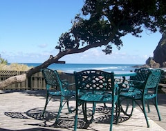 Toàn bộ căn nhà/căn hộ Magic South Piha Beachfront - Romantic Hideaway Right On The Beach (Piha, New Zealand)