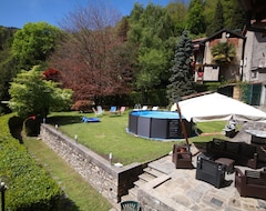 Koko talo/asunto Casa Veronica & Coccinella for 10 people with swimming pool. (Cadegliano-Viconago, Italia)