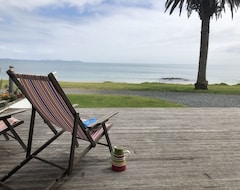 Căn hộ có phục vụ Golden Sand Beachfront Accommodation (Cable Bay, New Zealand)