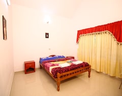 Otel OYO Home 5517 Grand Exotica Villa (Thekkady, Hindistan)
