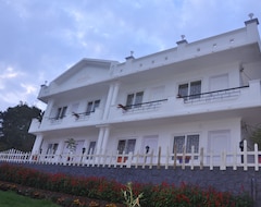 Khách sạn Drizzle Drop Inn (Udhagamandalam, Ấn Độ)