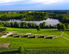 Tüm Ev/Apart Daire Masuria Resort Village, całoroczne domki z widokiem na jezioro, sauna i jacuzzi (Kruklanki, Polonya)