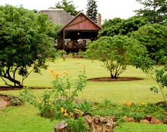 Otel Orchards Farm Cottages (Komatipoort, Güney Afrika)