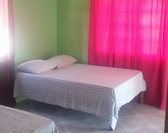 Khách sạn Tropical Breeze Guesthouse And Villa (Negril, Jamaica)