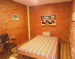 Khách sạn La Casa Amarilla City (Baños, Ecuador)