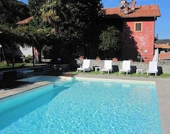 Hotel Apartment with 2 bedrooms in Massino Visconti, with wonderful lake view, pool access, enclosed garden - 3 km from the beach (Massino Visconti, Italy)