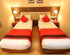 Hotel Oyo Premium Thaltej Cross Rd Sg Highway (Ahmedabad, Indija)