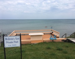 Entire House / Apartment Private Residents’-Only Beach With Large Deck Steps Away From Renovated Cottage (Caseville, USA)