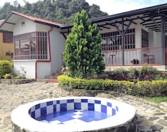 Khách sạn Casa La Gregorienne (La Vega, Colombia)
