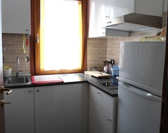 Toàn bộ căn nhà/căn hộ Modern Apartment With Wooden Beams (Terzo d'Aquileia, Ý)
