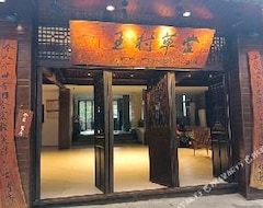 Khách sạn Wangcun Caotang Inn (Yongshun, Trung Quốc)