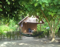 Entire House / Apartment Our Bungalow Set In Front White Sandy Beach Integrated With The Jungle (Raja Ampat, Indonesia)