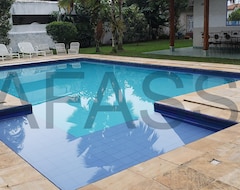 Tüm Ev/Apart Daire Casa de Praia Guarujá aconchegante com piscina e lazer (Guarujá, Brezilya)