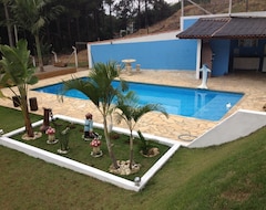 Entire House / Apartment Casa 3 Quartos, Piscina 4x9 Metros, Pomar, Playground, Lareira E Sala De Jog (Pinhalzinho, Brazil)