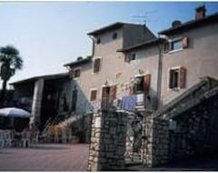 Hotel Ai Pignoi 1. sal - 4 sovepladser lejlighed, pool og udsigt - Garda (Garda, Italien)