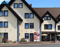 Khách sạn Hotel Vier Spitzen (Lauenförde, Đức)