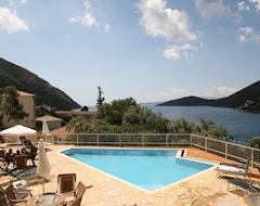 Hotel Rouda Village (Mikros Gialos, Grecia)