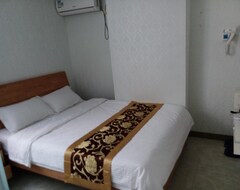 Hotel Cozy (Zuhai, Kina)