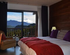 Hotel Kila Tai Tai Lodge (Curarrehue, Chile)