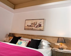 Drossia Palms Hotel & Nisos Beach Suites (Malia, Greece)