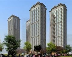 Mingrui Zuoan Apartment Hotel Dalian (Dalian, Kina)