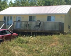 Entire House / Apartment Beautiful 3 bedroom cottage in a treed setting 1/2 mile to water access. (Manitowaning, Canada)