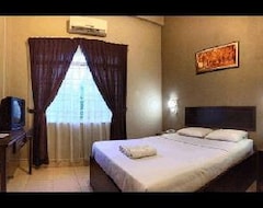 فندق Qas Hotel (Tanah Merah, ماليزيا)