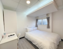 Xinshichengshangwuludiannew Lion City Hotel (Taipei City, Tayvan)