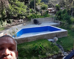 Toàn bộ căn nhà/căn hộ Romantic Cabin 200 Meters From A Private River (Piedra Blanca, Cộng hòa Dominica)
