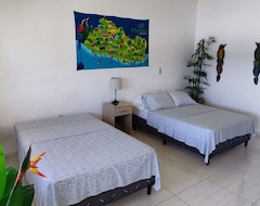 Entire House / Apartment Beachfront Room With A Private Bathroom (Carolina, El Salvador)