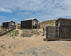 Koko talo/asunto Karo Hut B - Ninety Mile Beachfront Cabin (Awanui, Uusi-Seelanti)