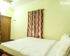 Khách sạn SPOT ON 39897 Mukkam Tourist Home (Kozhikode, Ấn Độ)