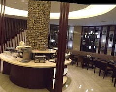 Hotel Baolong Homelike Shanghai Changxing Branch (Shanghái, China)