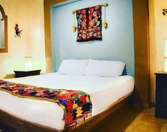 Khách sạn Hotel Casa De Las Flores (Playa del Carmen, Mexico)
