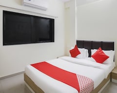 Hotel OYO Zion Inn (Vapi, India)