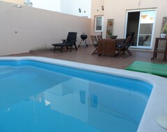 Toàn bộ căn nhà/căn hộ New Townhouse With Pool In Charming Village Close To The City Of Seville (Umbrete, Tây Ban Nha)