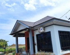 Koko talo/asunto Murni Inn Kampung Perigi (Kuah, Malesia)