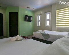 Khách sạn Oyo 1063 Manuelas Suites (Puerto Princesa, Philippines)