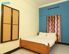 Khách sạn SPOT ON 39897 Mukkam Tourist Home (Kozhikode, Ấn Độ)