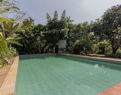 Khách sạn Treebo Trend Sadhoo Heritage Ayurvedic Spa & Pool (Kannur, Ấn Độ)
