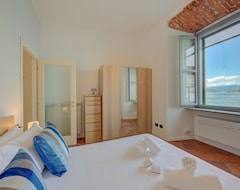 Khách sạn Aparthotel Arona - Happy Rentals (Arona, Ý)