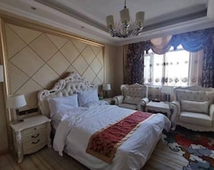 Hotel Xinglong Mansions (Golmud, China)