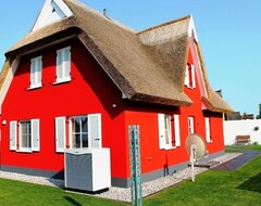 Cijela kuća/apartman 5 Sterne Ferienhaus Am Wasser, Reetdach, Terrasse, Kamin, Sauna, Wlan, Grill (Ummanz, Njemačka)