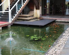 Resort/Odmaralište Qionghai Guantang Hot Spring Resort (Qionghai, Kina)