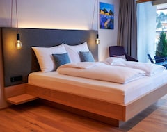 Hotelli Junior Suite Superior - Morning Red Longstay - Hotel Morning Time Naturally. Bed And Brunch (Saalfelden am Steinernen Meer, Itävalta)